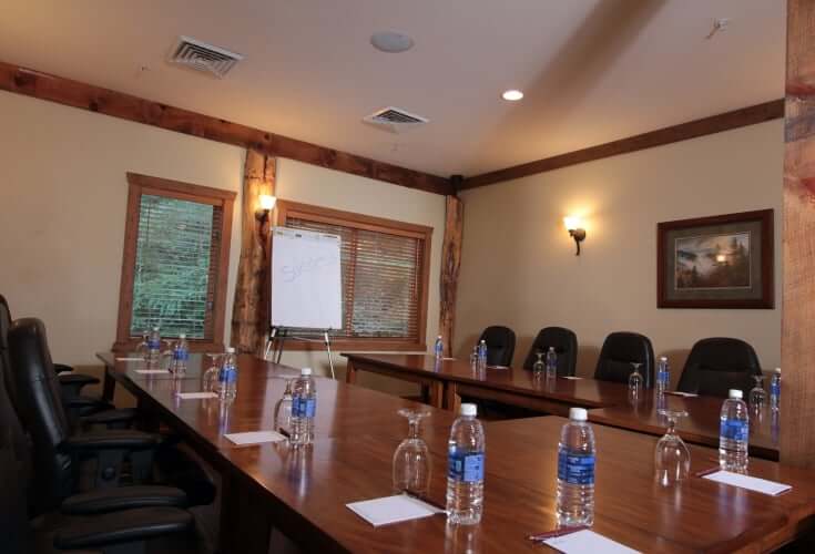 meeting room with water bottles on table