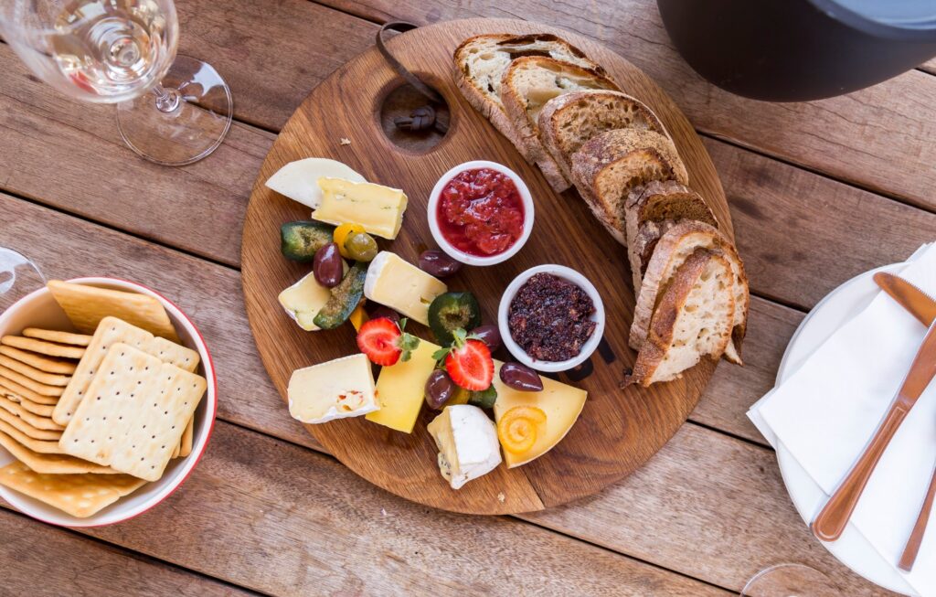 A wine and cheese board on an Asheville food tour.