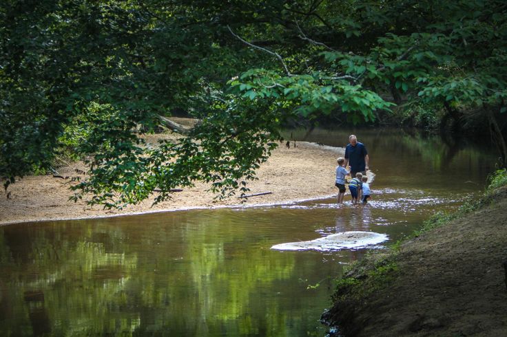 Visitors at the Chewacla State Park waterfall near Auburn AL
