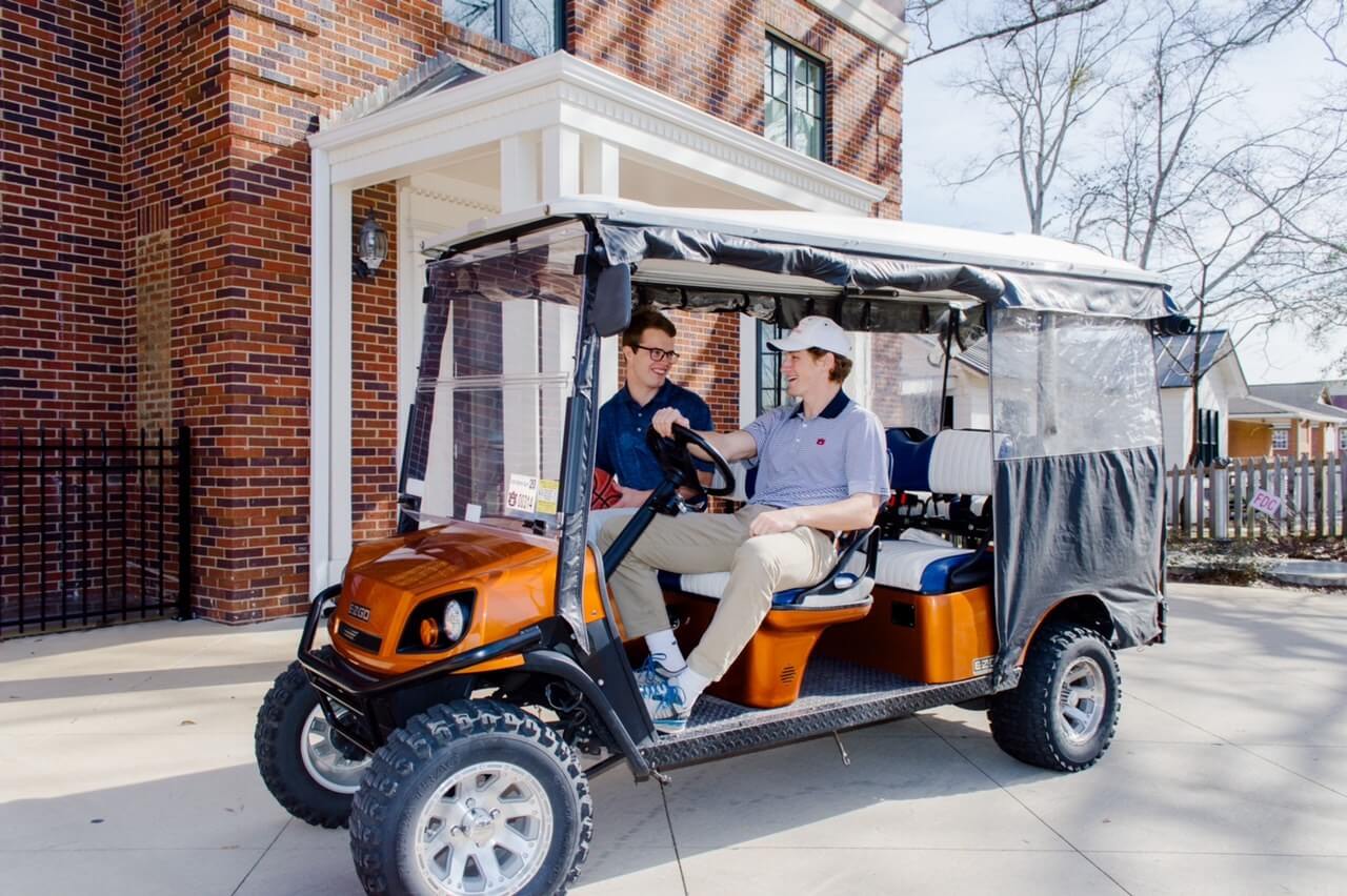 Auburn golf cart tours student-led at The Collegiate Hotel