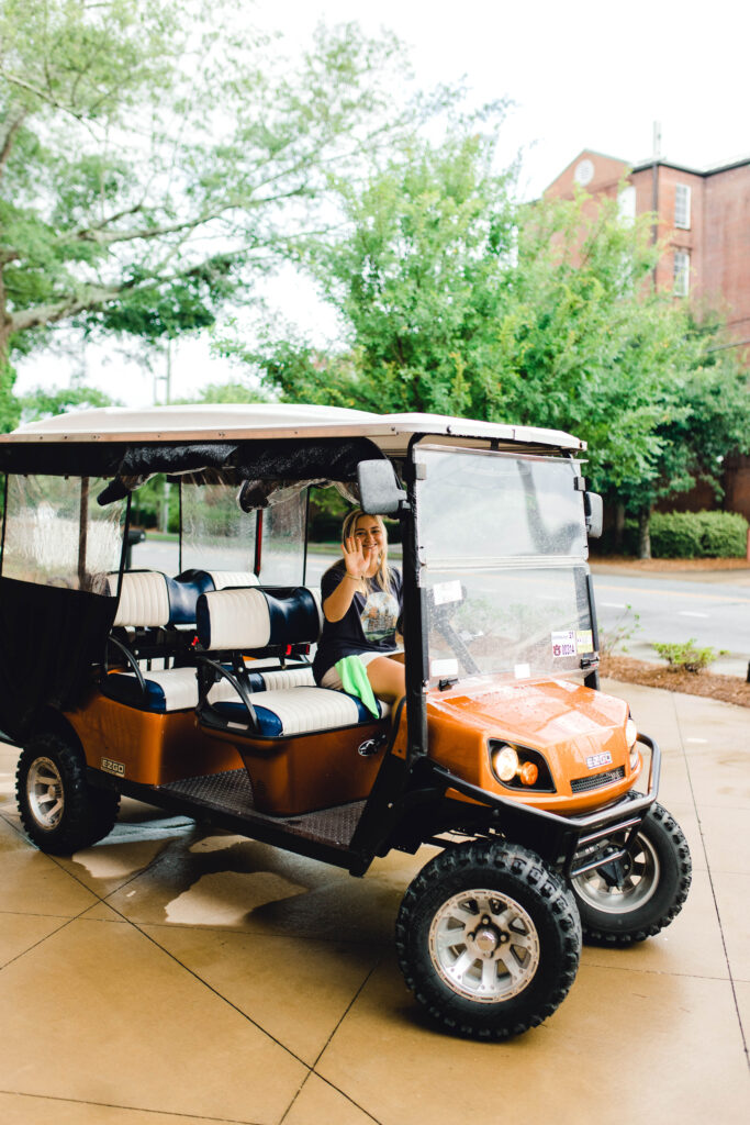 Auburn campus golf cart tour Samford Hall photo stop