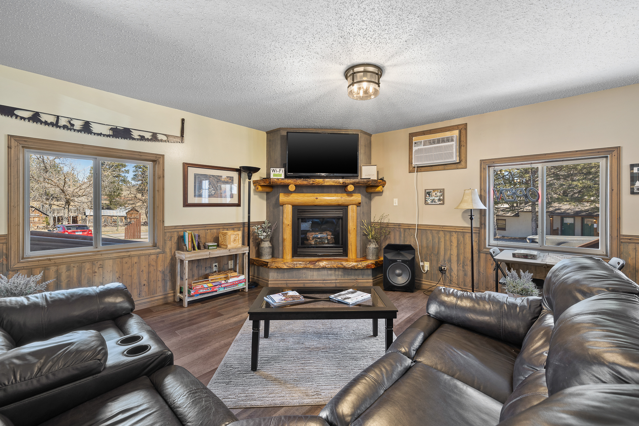 Two couches facing tv in living room area.