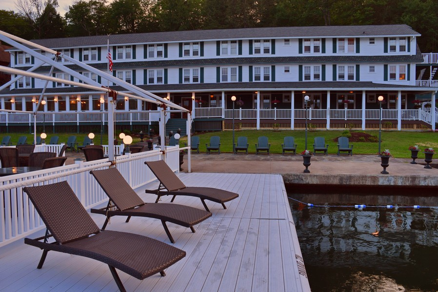 lounge chairs on the dock with a view of the inn