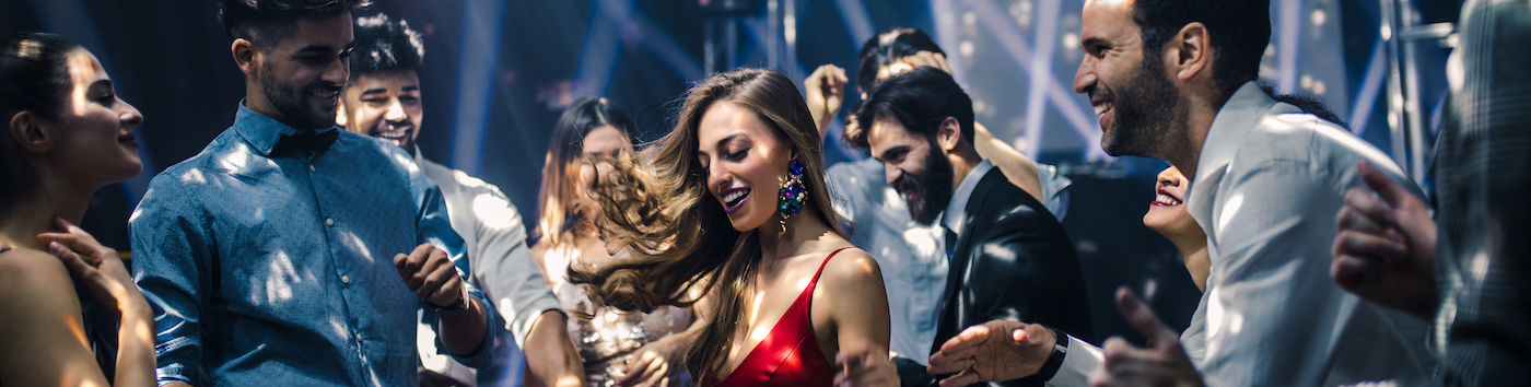 Shot of a young woman dancing in the nightclub