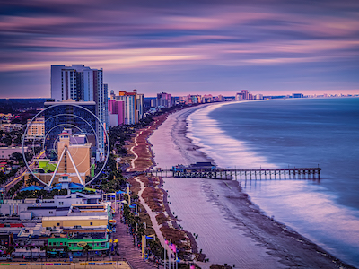 Long Exposure photography of surf and clouds at Myrtle Beach, South Carolina during winter morning.