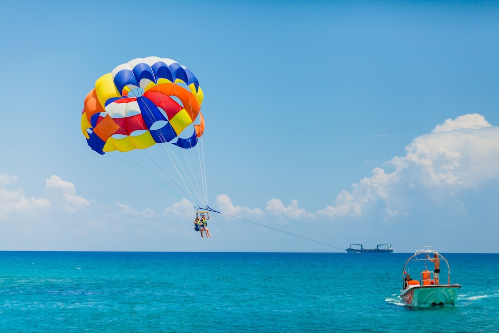 Parasailing at afternoon over ocean
