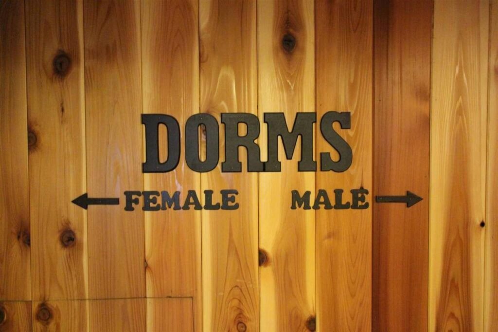 Sign for male and female dorms