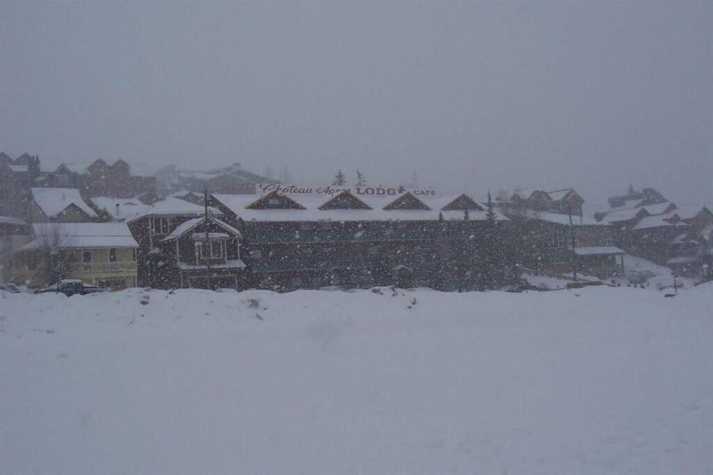 Distance shot of the lodge during heavy snow
