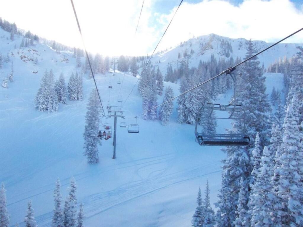 Mountainside in snow with ski lift