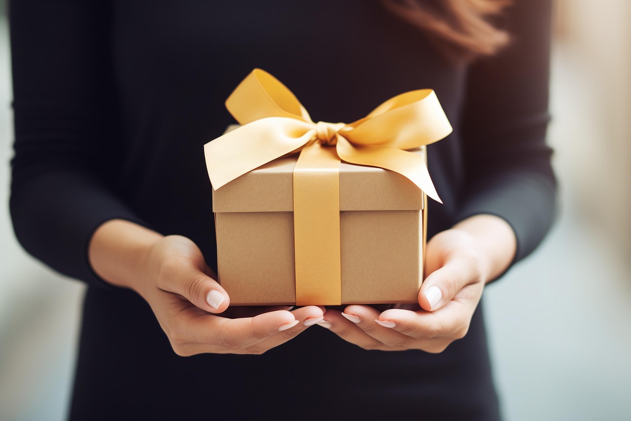 ai generated, happy birthday, gift, present, bow, woman, vacation, surprise, hand, celebration, valentine's day, christmas, object, love, anniversary, decoration, paper, wrapped, gold, box-8408530.jpg