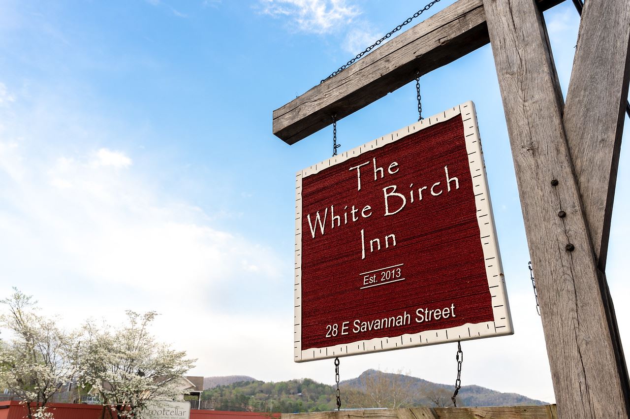 White Birch Inn sign mountain in view