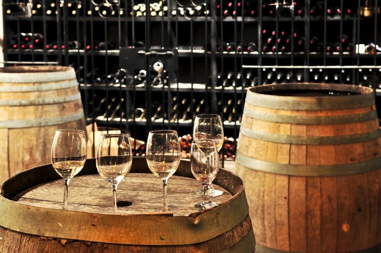 Wine glasses and barrels
