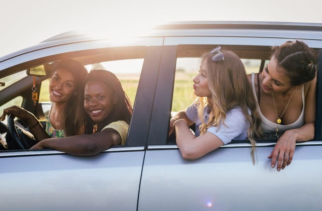 group of women inside a car