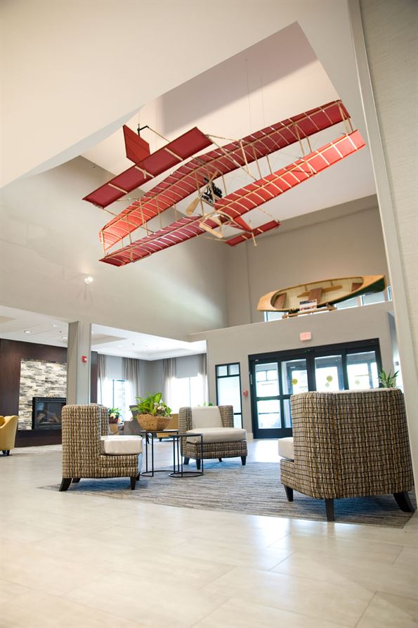 Hotel Lobby with model plane hanging from ceiling