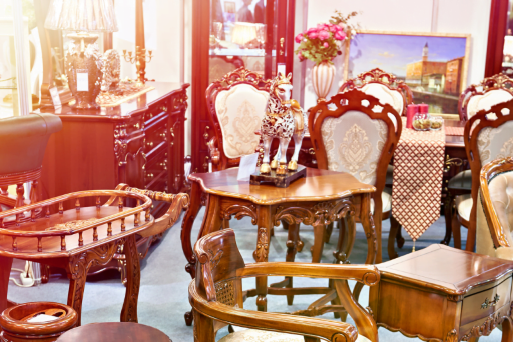 Various antique furniture in store on display.