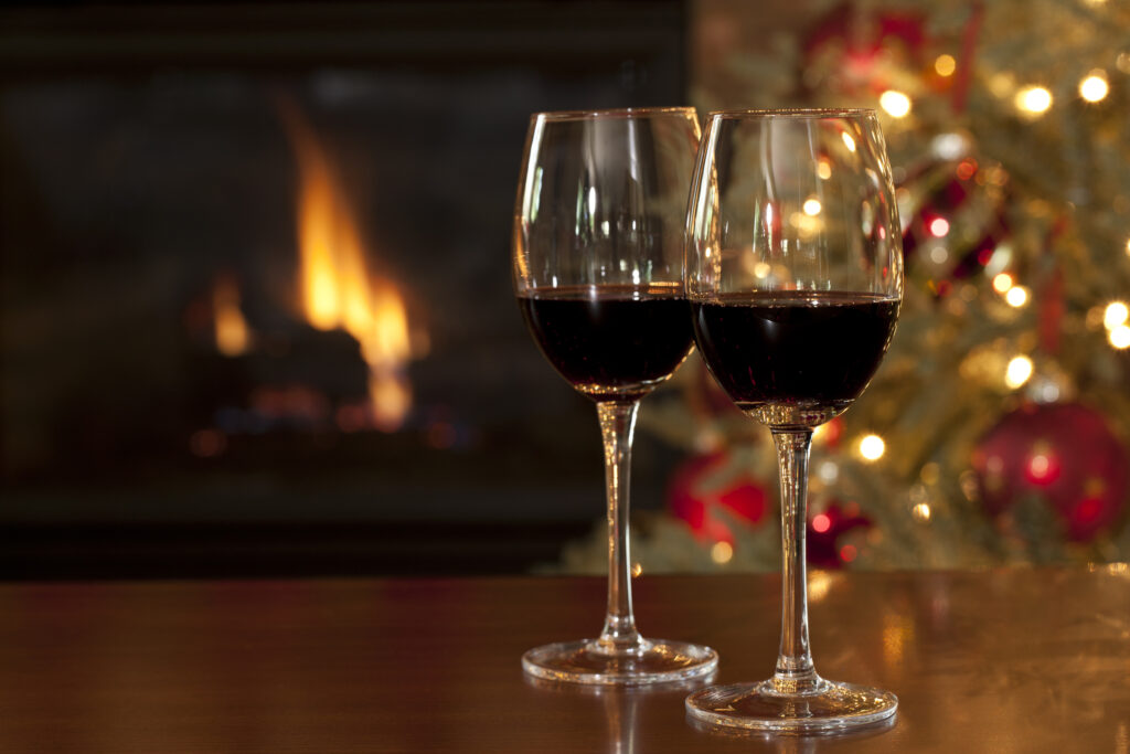 red wine in front of fire