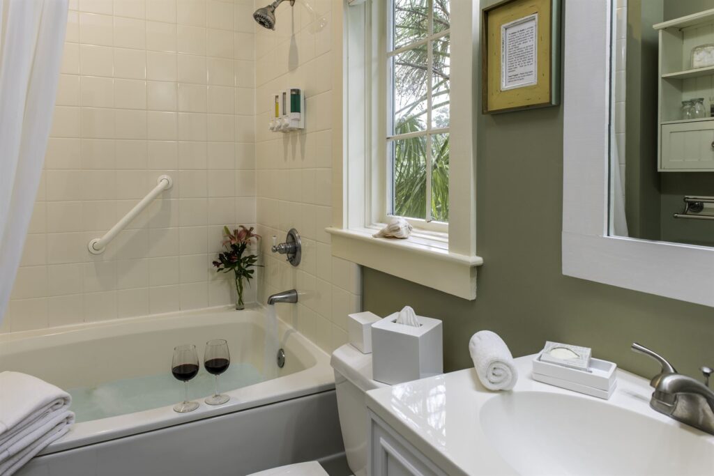 Room 14 at The Addison on Amelia Island - Bathroom with tub and shower combo