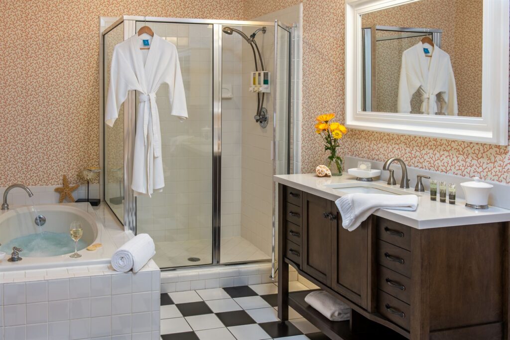 Room 2 at The Addison on Amelia Island - bathroom with shower and soaking tub