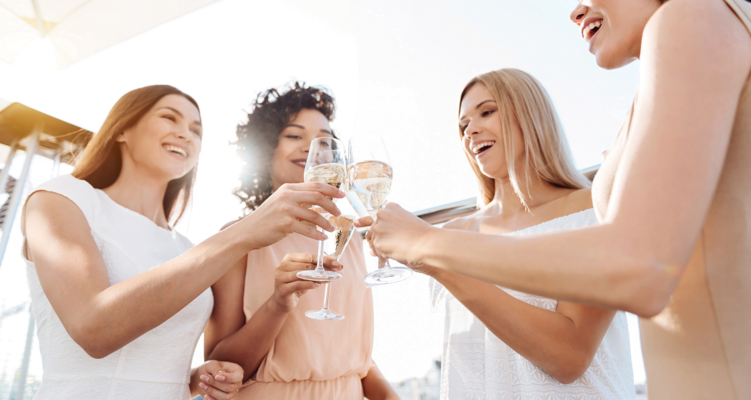 women cheersing together on their Florida bachelorette party