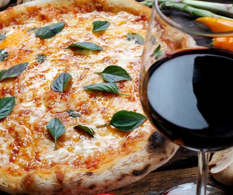 Pizza and glass of red wine