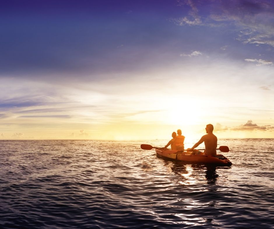 People kayaking on the ocean