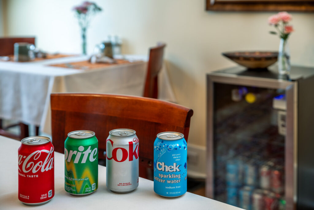 Complimentary sodas-sparkling water-guest refrigerator