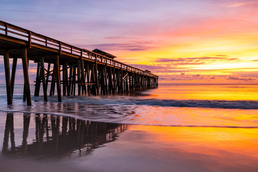 Sunrise and Wooden Pier on Fernandina Beach, Amelia Island, Florida, USA