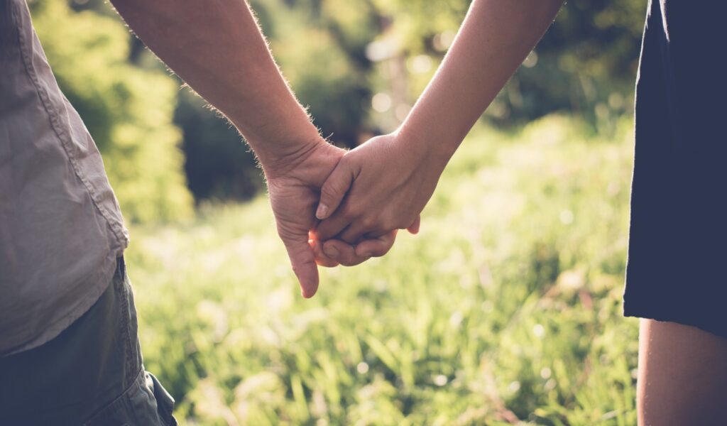 couple holding hands, romantic things to do