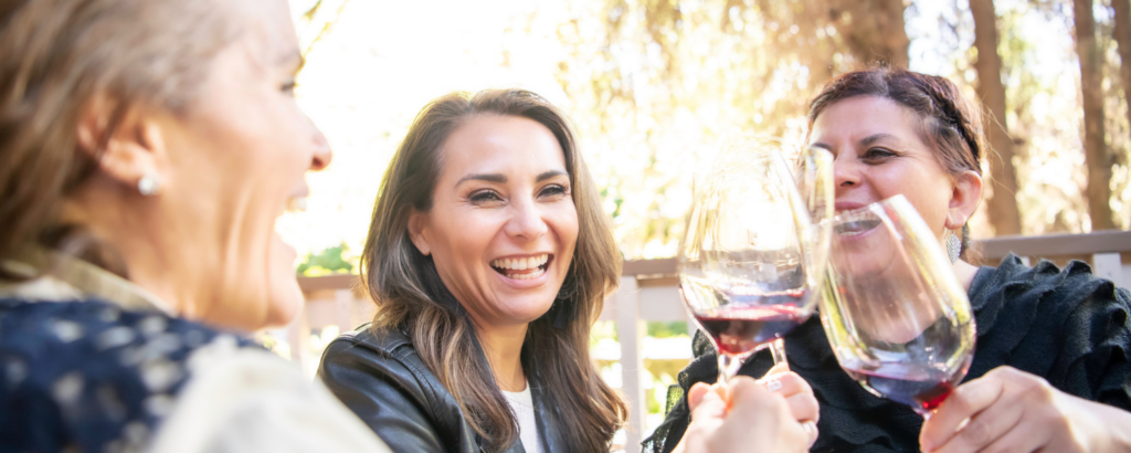 three women at wine tasting