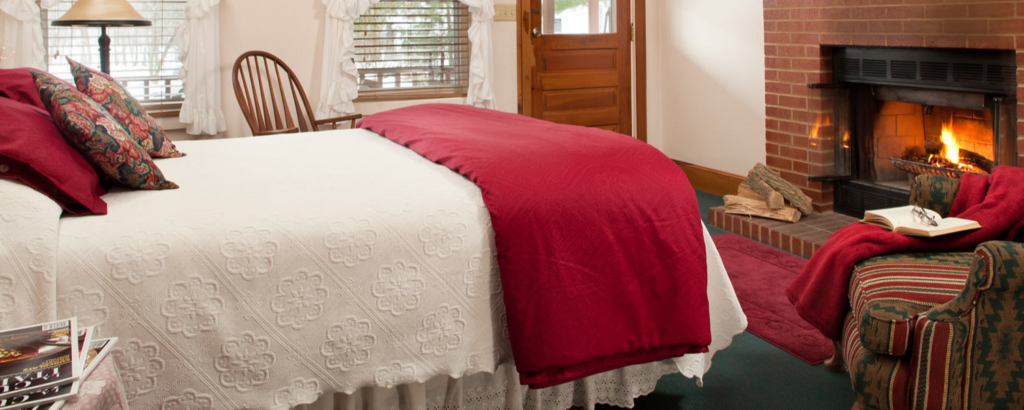 guest room with fireplace at the white oak inn bed & breakfast