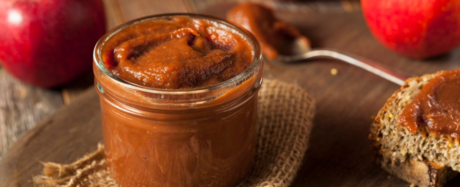 Close up of apple butter in glass jar
