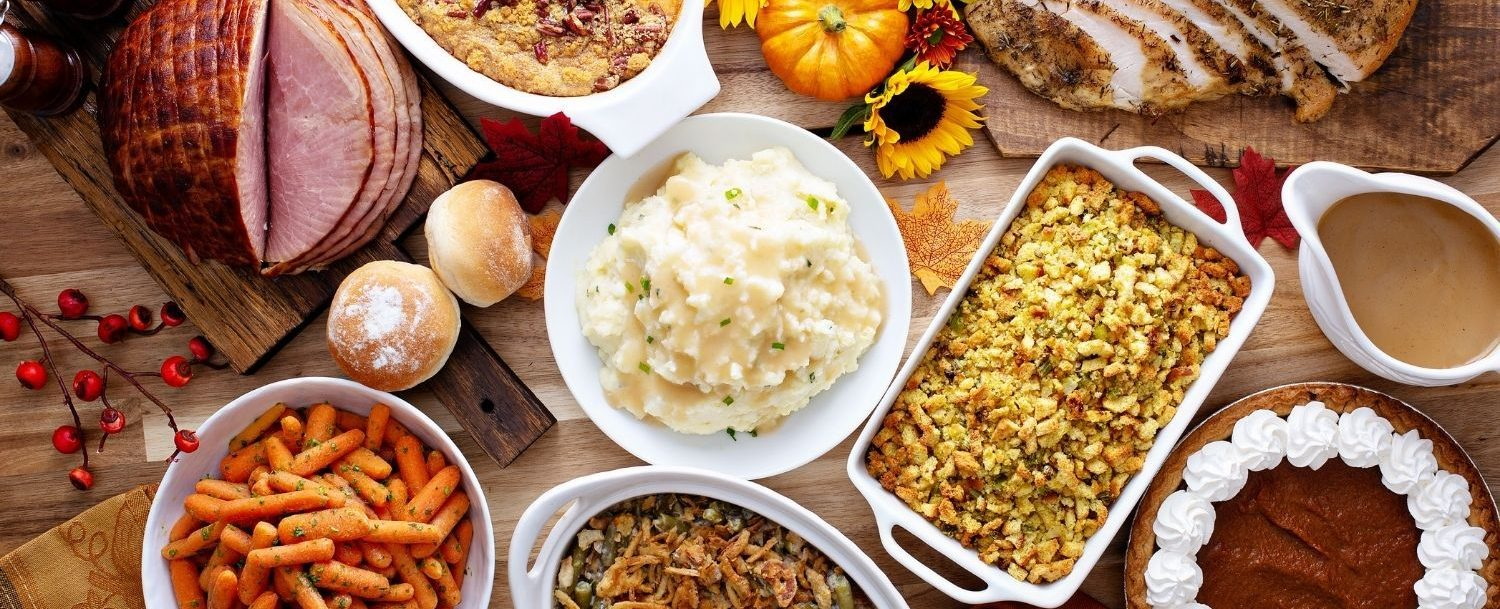 Various Thanksgiving food items on a table
