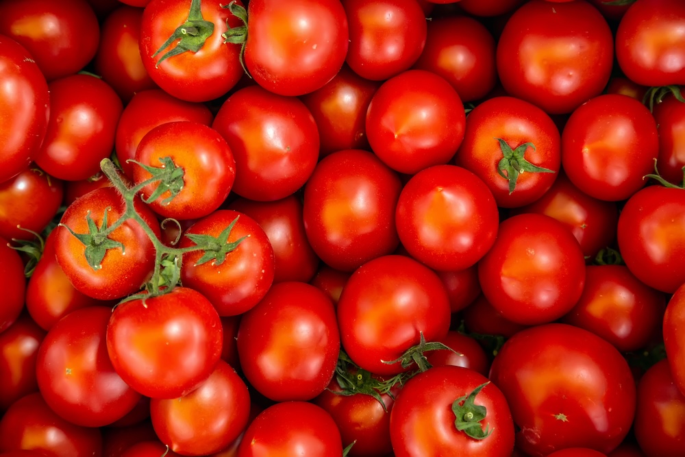 organic tomato closeup vegetable background Top view blur textures soft focus.