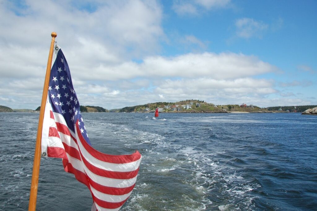 American Flag flying on a boat.