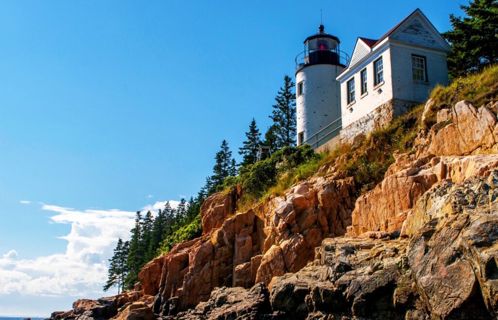 Lighthouse with blue sky background.