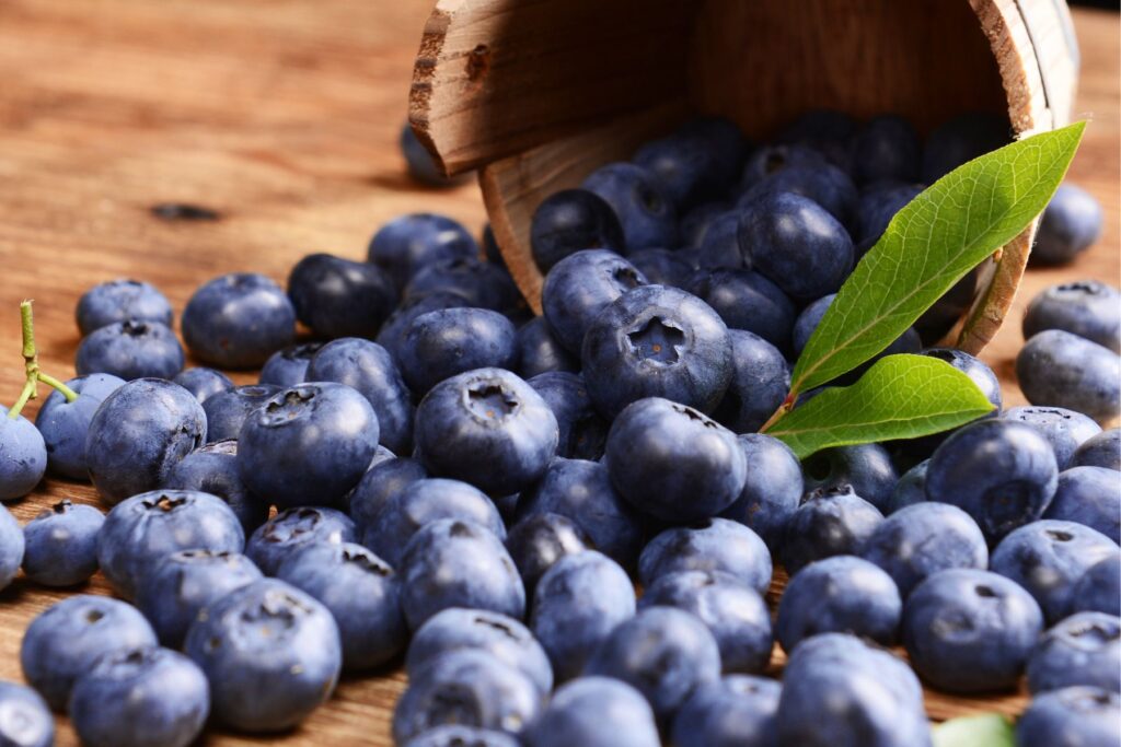 Blueberries sprawled out on a table