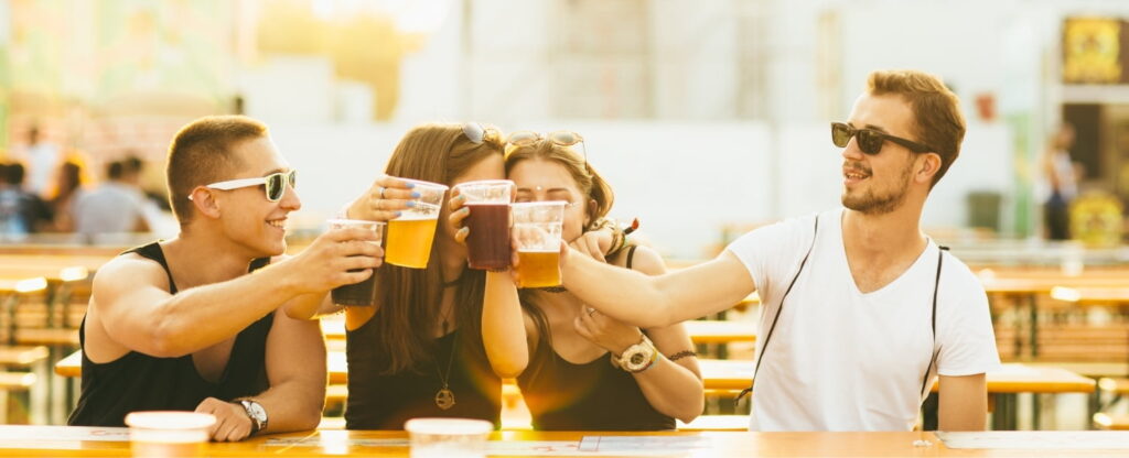 Friends Cheers at a Beer Festival