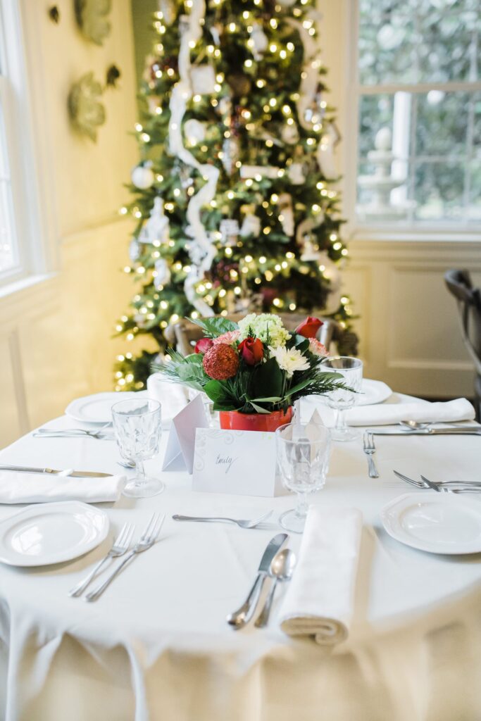 Christmas Wedding Setup Dining Table and Tree in Background