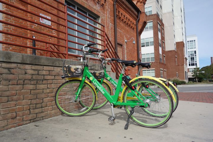 DURHAM,NC/USA: LimeBike dockless bike share bicycles parked near downtown Durham, NC