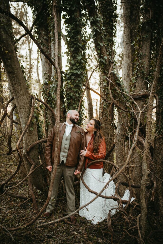 Couple by Tree Getting Photo for Wedding