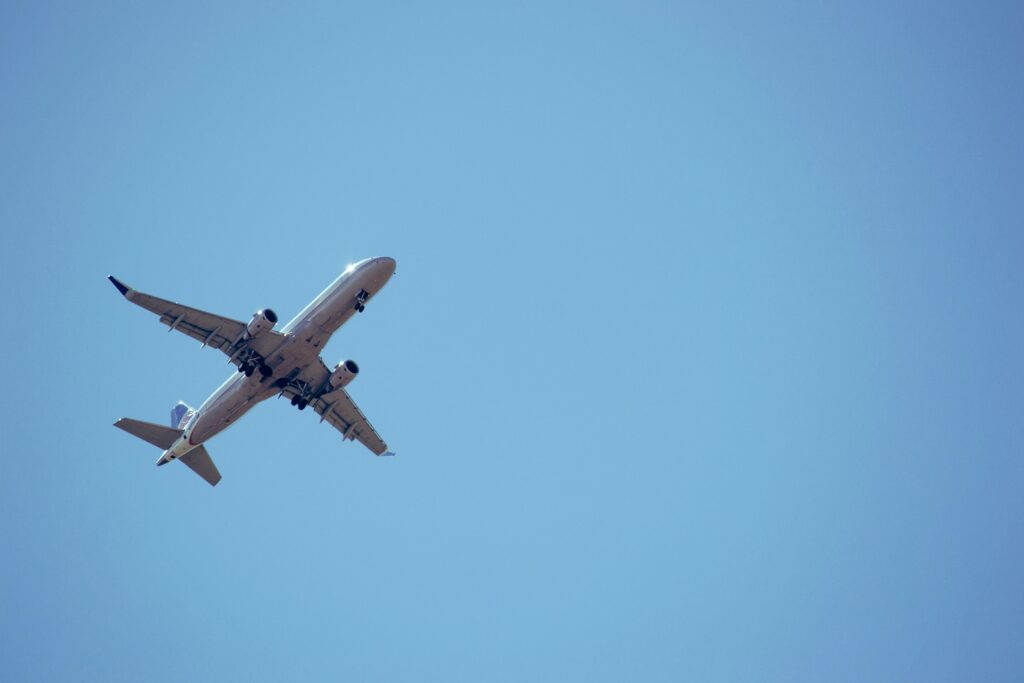 Airplane flying througha blue sky