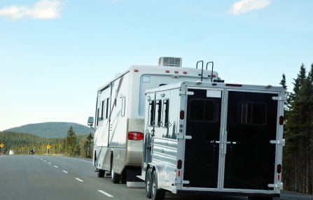 RV hauling a trailer on the road