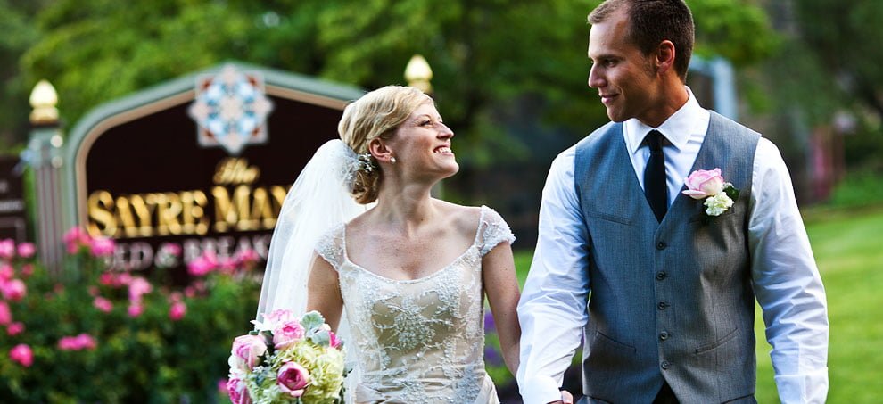 Wedding Couple with Sayre Mansion Sign