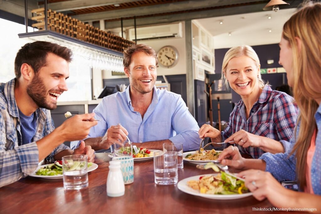 Group of friends eating at The Hamilton Kitchen and Bar