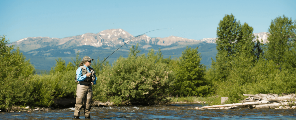 woman fly fishing