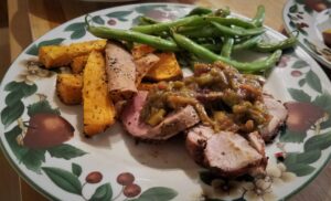 Apple chutney on top of pork tenderloin.