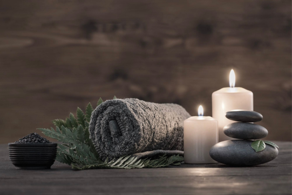 spa towel and candles