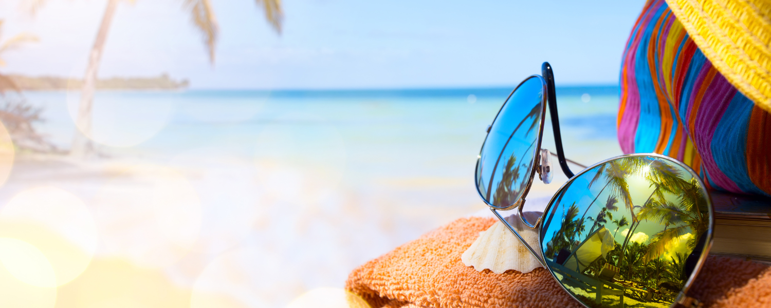 sunglasses with beach in background
