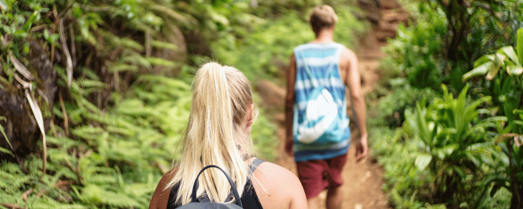 couple hiking in tropical climate