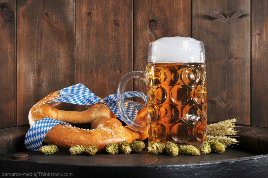 Oktoberfest food. Beer and a large pretzel.